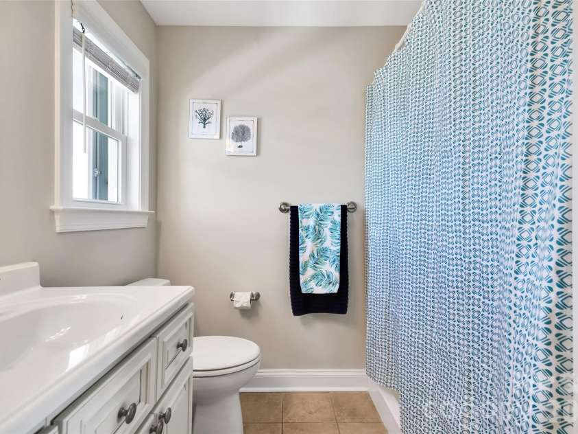 1018 Dolphin Drive, Oak Island, NC 28465.  MLS# CAR4355087, YatesRealty ID 8487. 