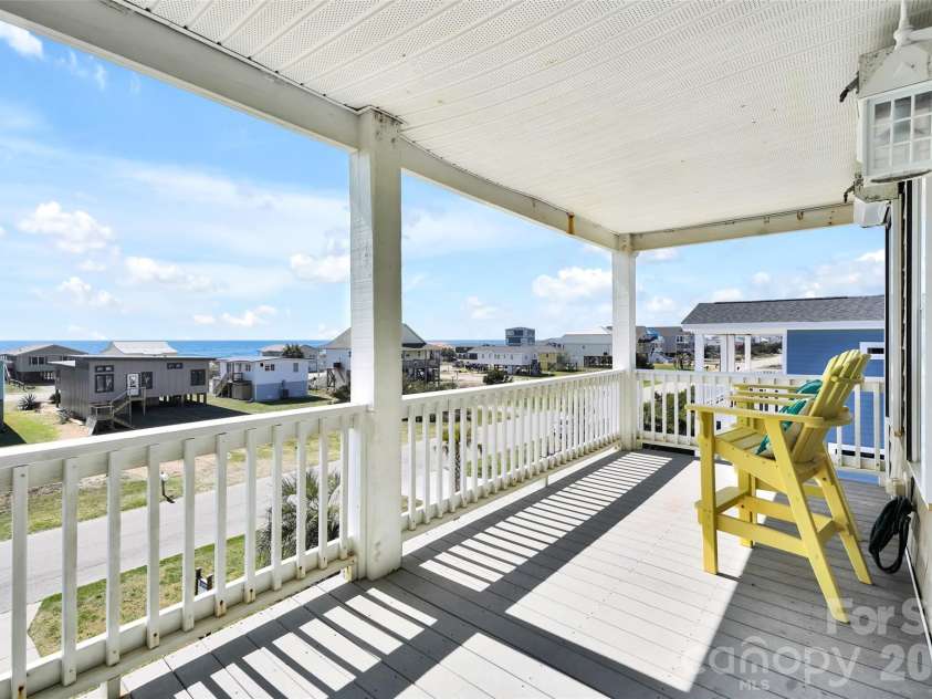 1018 Dolphin Drive, Oak Island, NC 28465.  MLS# CAR4355087, YatesRealty ID 8487. 
