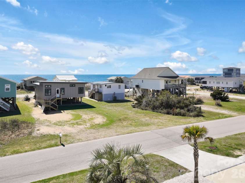 1018 Dolphin Drive, Oak Island, NC 28465.  MLS# CAR4355087, YatesRealty ID 8487. 