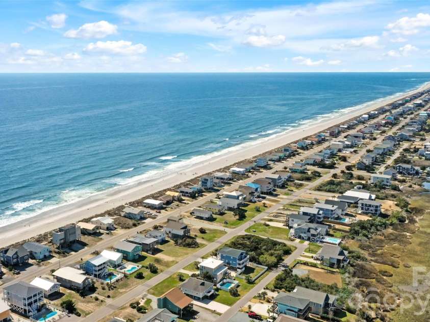1018 Dolphin Drive, Oak Island, NC 28465.  MLS# CAR4355087, YatesRealty ID 8487. 