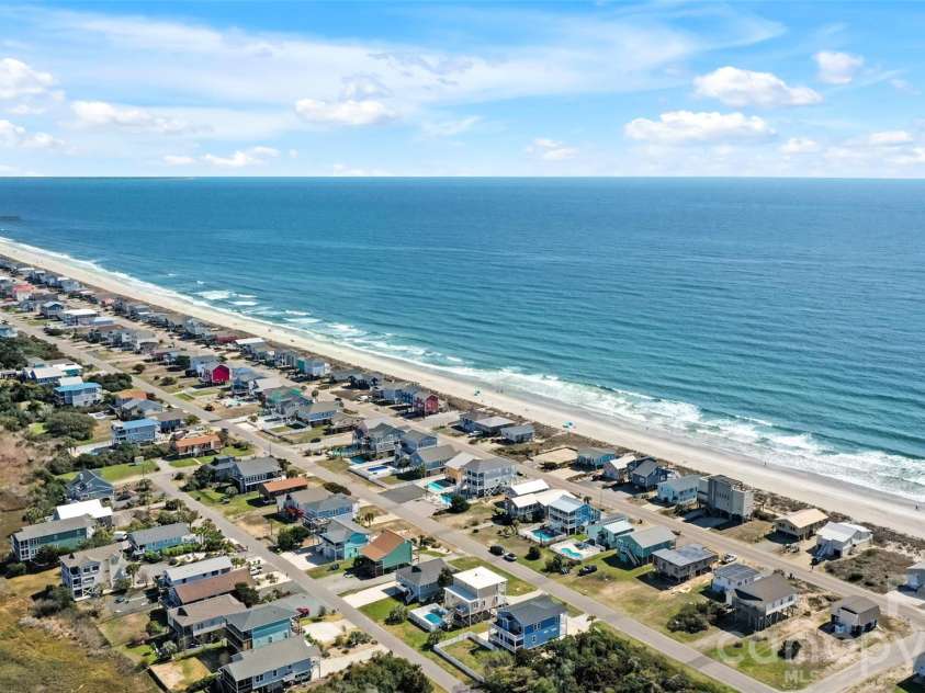 1018 Dolphin Drive, Oak Island, NC 28465.  MLS# CAR4355087, YatesRealty ID 8487. 