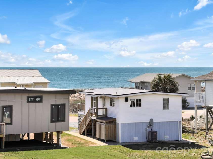1018 Dolphin Drive, Oak Island, NC 28465.  MLS# CAR4355087, YatesRealty ID 8487. Views for Days