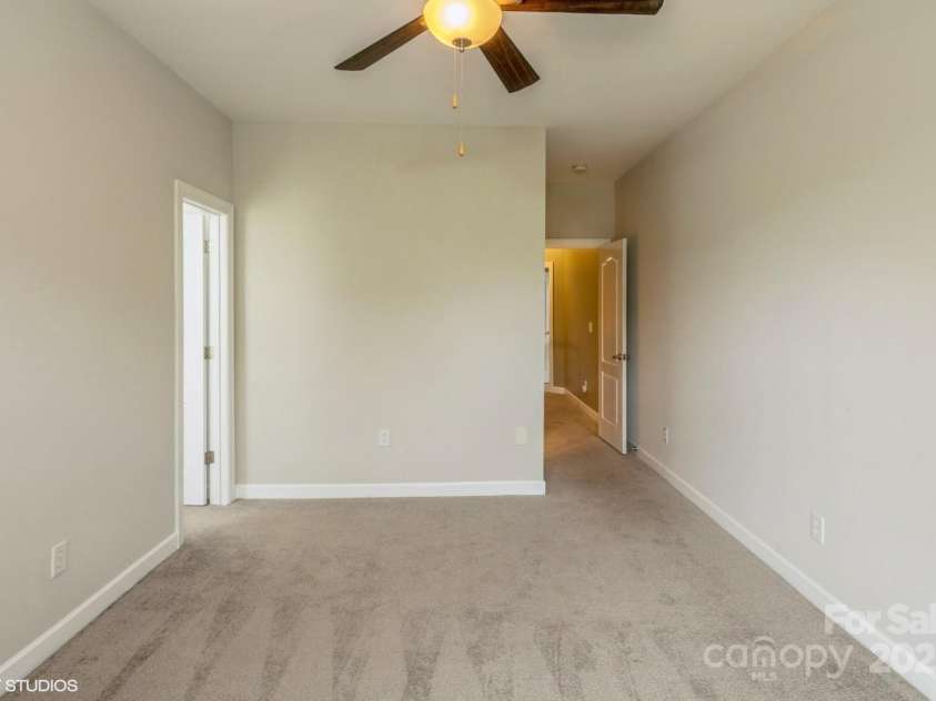 10012 Royal Colony Drive, Waxhaw, NC 28173.  MLS# CAR4250222, YatesRealty ID 8489. 2nd bedroom with walk in closet and bath