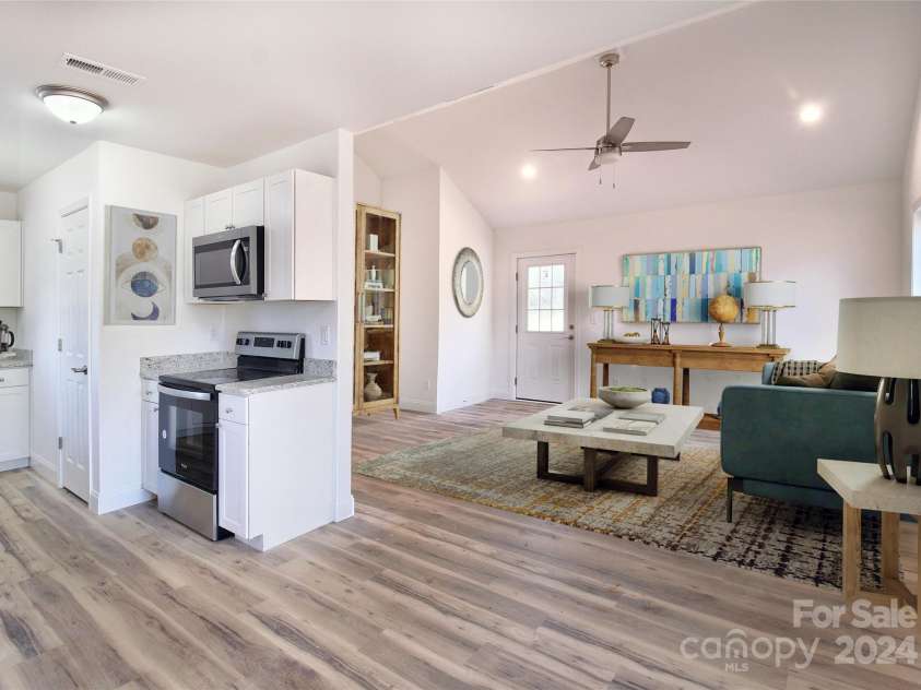 380 Quinn Hill Lane, Mars Hill, NC 28754.  MLS# CAR4127561, YatesRealty ID 8491. Main level staged