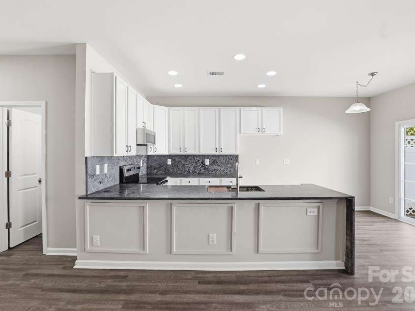 2095 Shady Pond Drive, Clover, SC 29710.  MLS# CAR4363170, YatesRealty ID 8492. Gorgeous kitchen with recent granite counter tops installed
