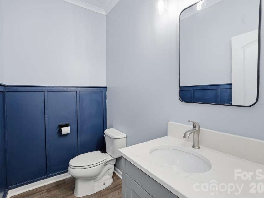 2095 Shady Pond Drive, Clover, SC 29710.  MLS# CAR4363170, YatesRealty ID 8492. Half bath on main level with updated vanity and lighting