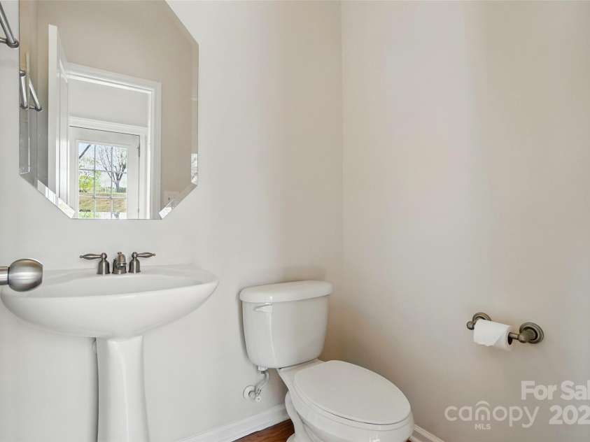 3619 Grove Creek Pond Drive, Concord, NC 28027.  MLS# CAR4244273, YatesRealty ID 8492. Half bath downstairs