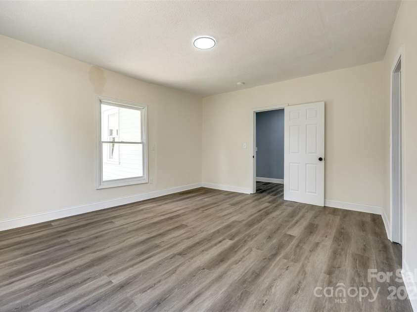 107 Maurice Street, Monroe, NC 28112.  MLS# CAR4245480, YatesRealty ID 8495. Primary Bedroom