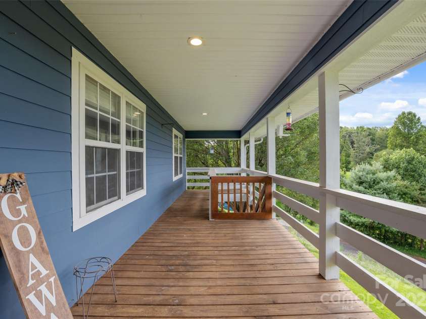 271 Breton Ridge Road, Leicester, NC 28748.  MLS# CAR4284121, YatesRealty ID 8497. Extra Large Upper Level Front Porch