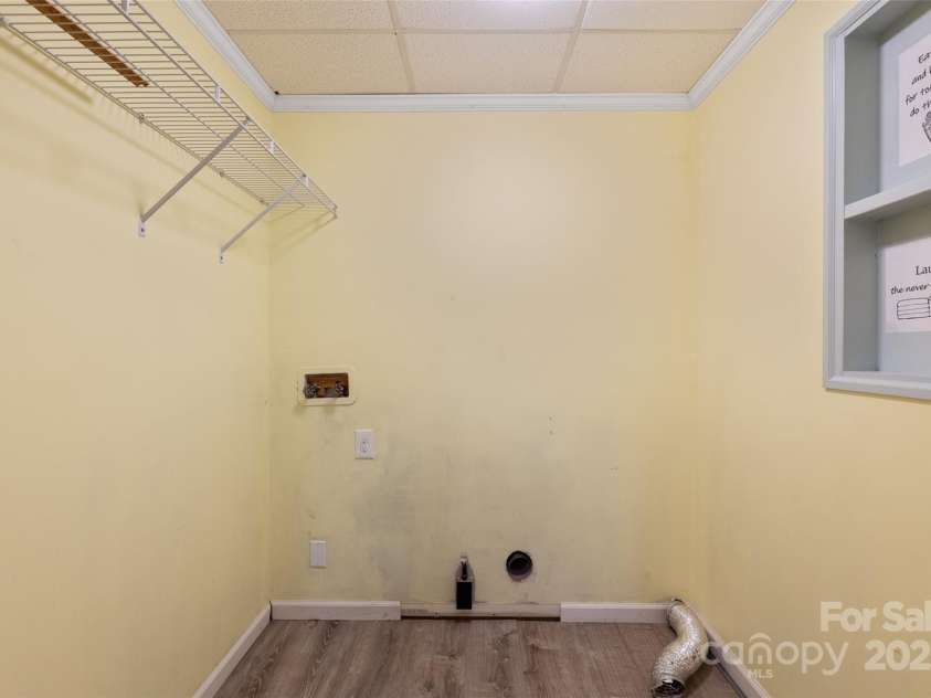 271 Breton Ridge Road, Leicester, NC 28748.  MLS# CAR4284121, YatesRealty ID 8497. Lower Level Laundry Room