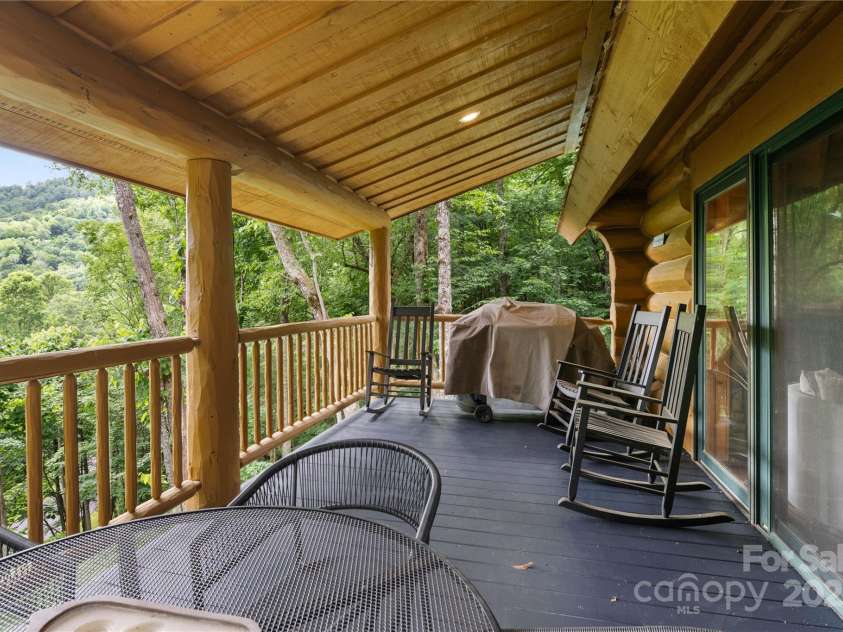 205 Chestnut Village, Mars Hill, NC 28754.  MLS# CAR4273023, YatesRealty ID 85. Back covered porchh