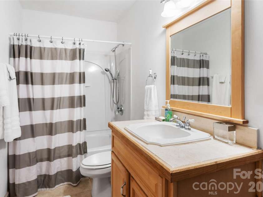 205 Chestnut Village, Mars Hill, NC 28754.  MLS# CAR4273023, YatesRealty ID 85. Downstairs bathroom 
