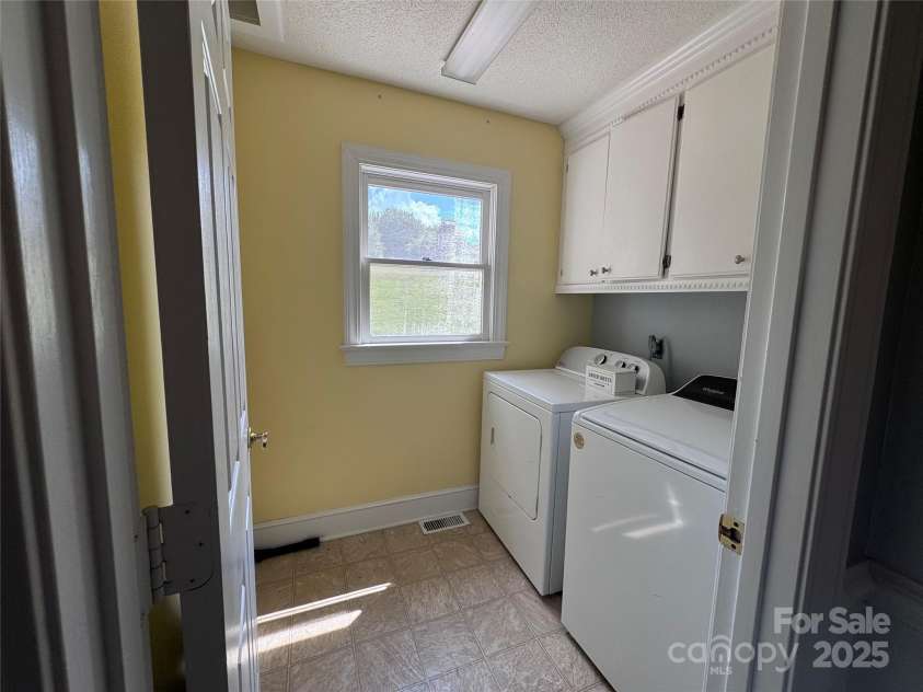 331 Polk Ford Road, Stanfield, NC 28163.  MLS# CAR4174696, YatesRealty ID 850. Laundry room from hall