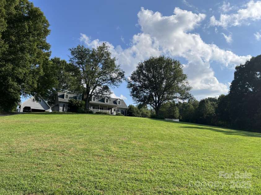 331 Polk Ford Road, Stanfield, NC 28163.  MLS# CAR4174696, YatesRealty ID 850. Mid-front yard