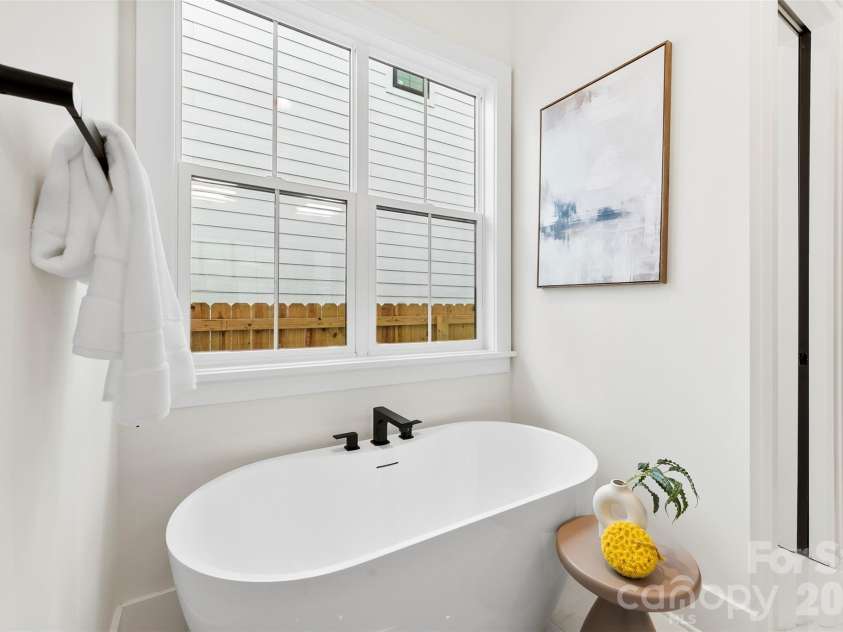 2025 South Street, Charlotte, NC 28208.  MLS# CAR4345630, YatesRealty ID 8502. Primary Bathroom soaking tub