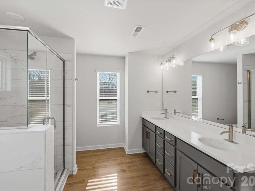 2013 White Cypress Court, Charlotte, NC 28216.  MLS# CAR4356351, YatesRealty ID 8509. Beautiful quartz vanity