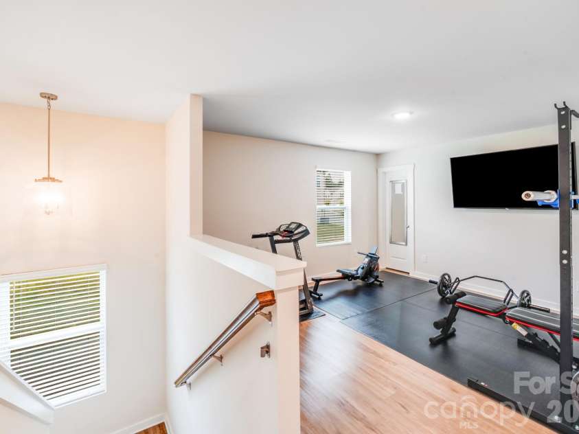 2013 White Cypress Court, Charlotte, NC 28216.  MLS# CAR4356351, YatesRealty ID 8509. Massive Loft