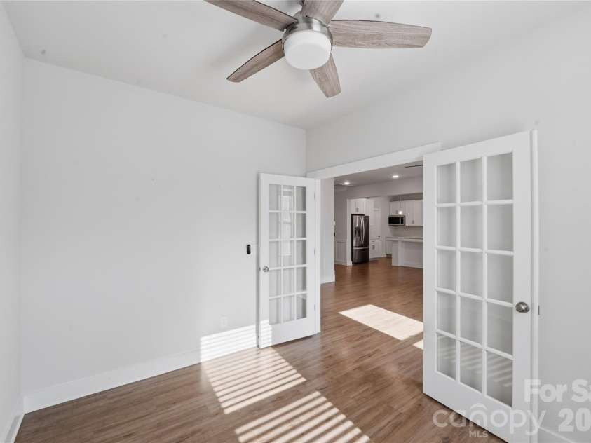 2013 White Cypress Court, Charlotte, NC 28216.  MLS# CAR4356351, YatesRealty ID 8509. Office with french doors on main level