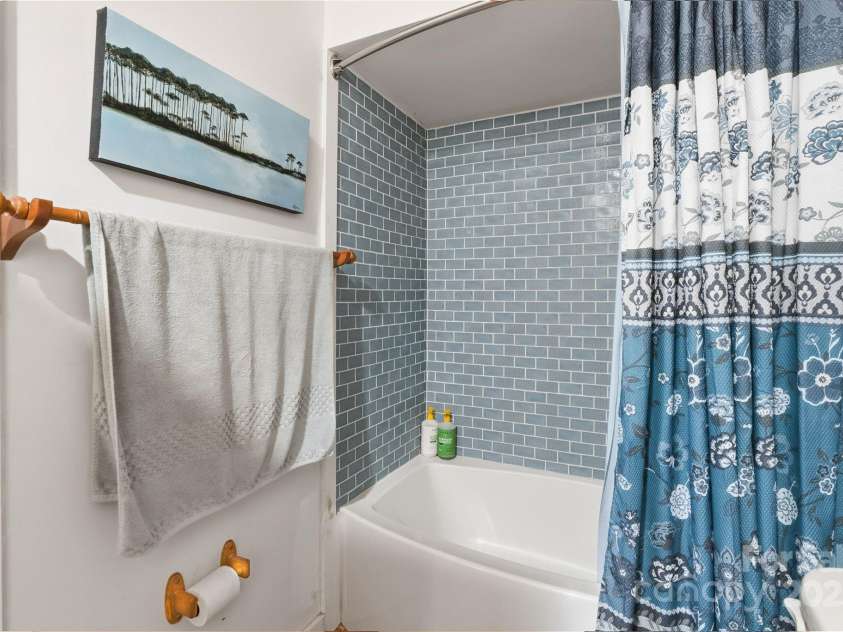 123 Holly Hill Farm Road, Mars Hill, NC 28754.  MLS# CAR4321116, YatesRealty ID 852. Downstairs Bathroom with Soaking Tub!