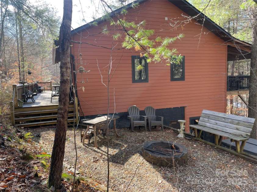 123 Holly Hill Farm Road, Mars Hill, NC 28754.  MLS# CAR4321116, YatesRealty ID 852. Fire pit next to hot tub! 