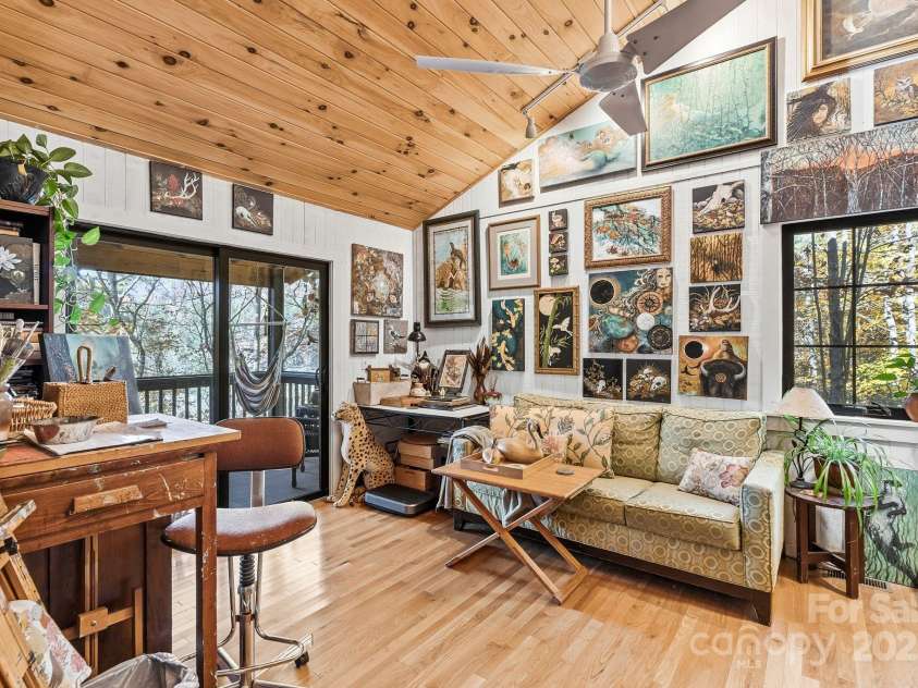 123 Holly Hill Farm Road, Mars Hill, NC 28754.  MLS# CAR4321116, YatesRealty ID 852. Main Floor Bedroom 2 used as Art Studio with Access to Deck
