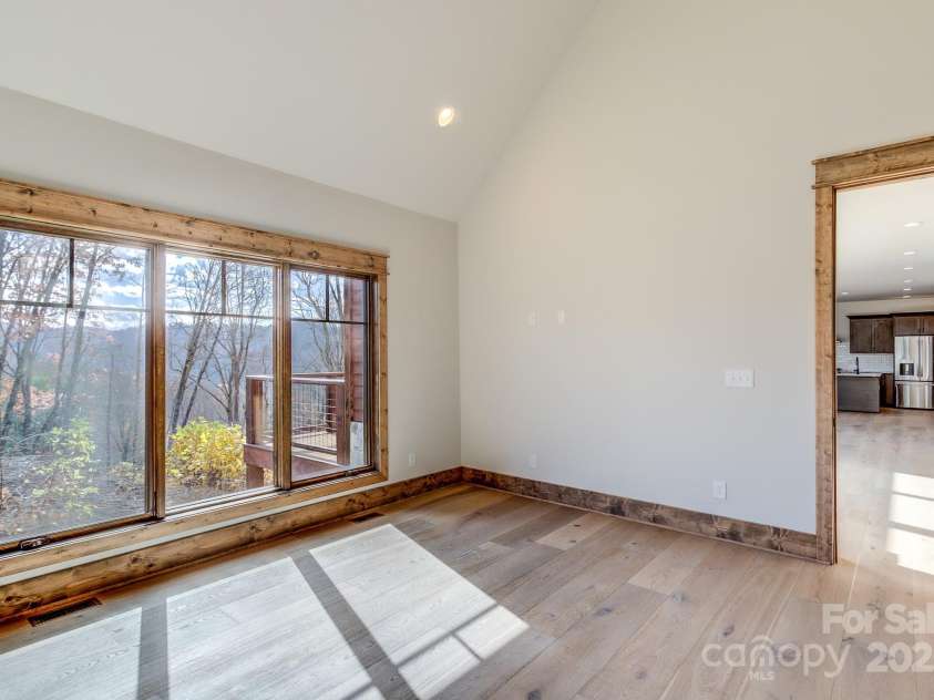 37 Tioga Trail, Banner Elk, NC 28604.  MLS# CAR4215738, YatesRealty ID 852. Large windows bring in tons of natural light into primary bedroom