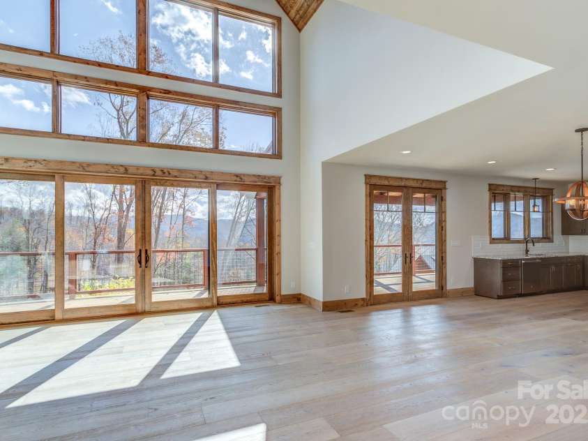 37 Tioga Trail, Banner Elk, NC 28604.  MLS# CAR4215738, YatesRealty ID 852. Wall of Windows