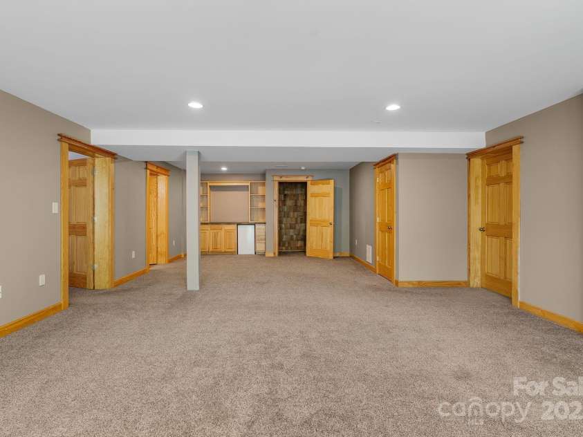 32 Indian Knob Road, Asheville, NC 28803.  MLS# CAR4246134, YatesRealty ID 8521. Lower rec room
