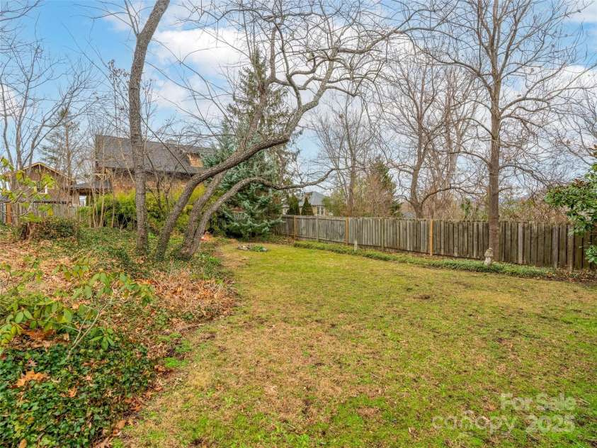 12 Bearden Avenue, Asheville, NC 28801.  MLS# CAR4331679, YatesRealty ID 8522. Large back yard with so much potential.