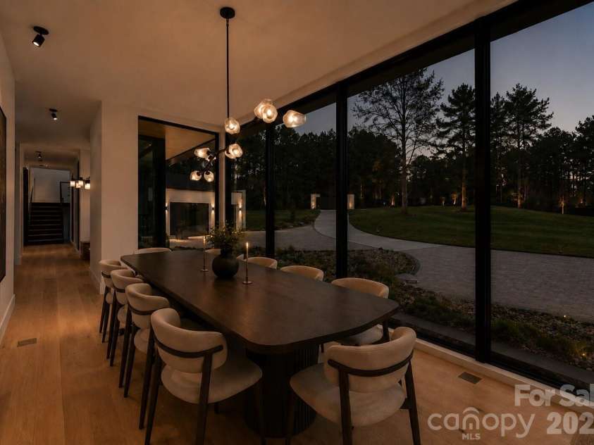 2536 Brawley School Road, Mooresville, NC 28117.  MLS# CAR4340912, YatesRealty ID 8523. Dining area. Disclosure: This image has been digitally enhanced with AI-generated virtual staging and does not reflect the property's actual condition.