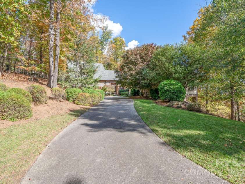 150 Cherry Hill, Mill Spring, NC 28756.  MLS# CAR4201746, YatesRealty ID 8524. Guest will be delighted when they enter this private driveway and see what awaits!
