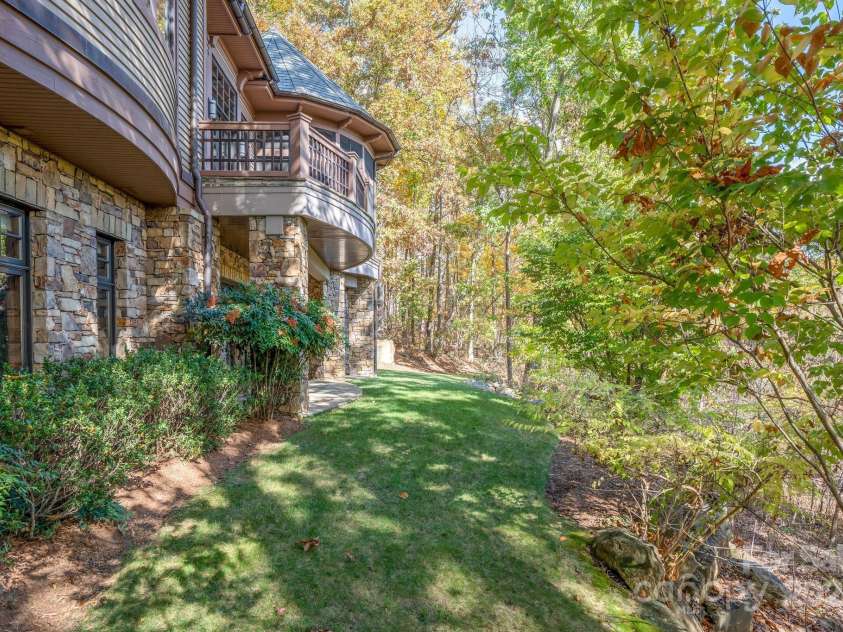 150 Cherry Hill, Mill Spring, NC 28756.  MLS# CAR4201746, YatesRealty ID 8524. Not much lawn to maintain, just beautifully landscaped garden area.  