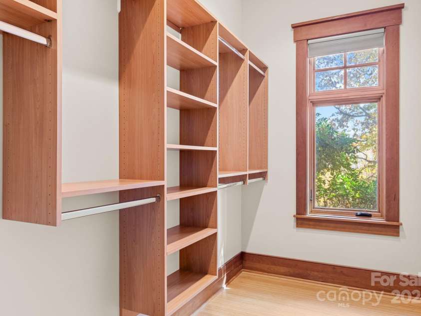 150 Cherry Hill, Mill Spring, NC 28756.  MLS# CAR4201746, YatesRealty ID 8524. Plenty of built in storage in this lower level walk in closet. The attention to detail in this home is outstanding.