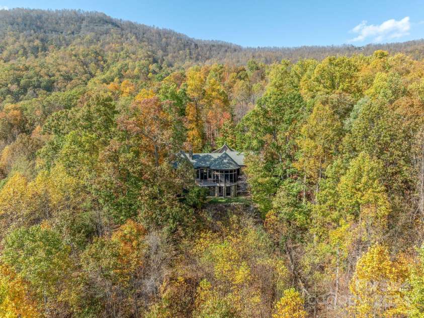150 Cherry Hill, Mill Spring, NC 28756.  MLS# CAR4201746, YatesRealty ID 8524. Total privacy and long range views, with the added benefit of a private, high quality community with over the top amenities.