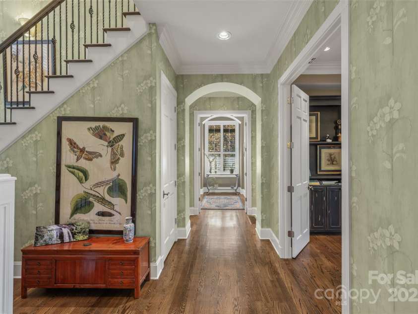 250 Big Bear Road, Highlands, NC 28741.  MLS# CAR4313436, YatesRealty ID 8529. Hallway to Primary Suite & Office
