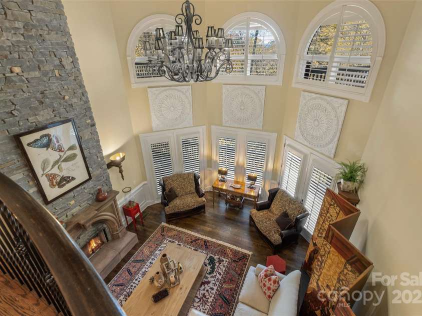250 Big Bear Road, Highlands, NC 28741.  MLS# CAR4313436, YatesRealty ID 8529. Living Room from interior balcony