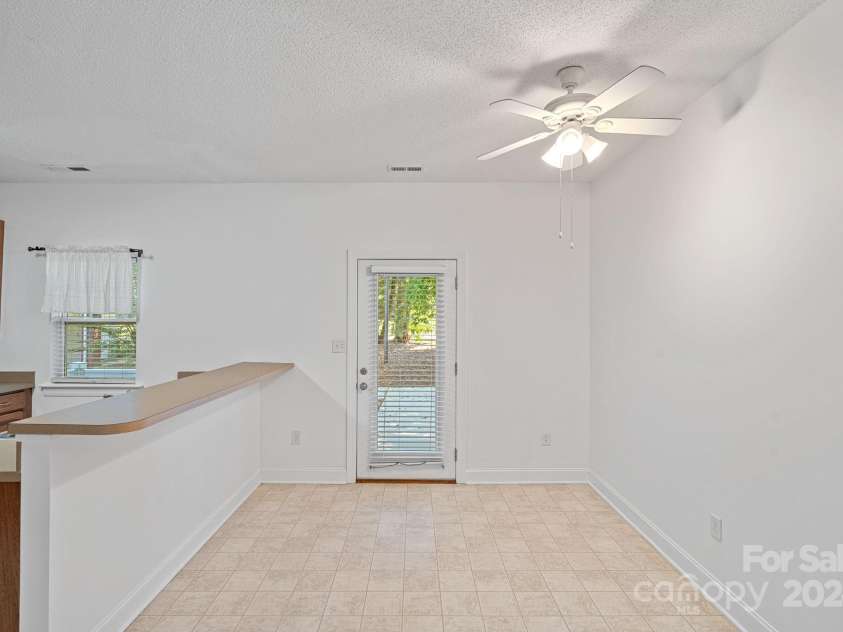 116 Par Place, Mooresville, NC 28115.  MLS# CAR4177547, YatesRealty ID 853. Dining area and back door