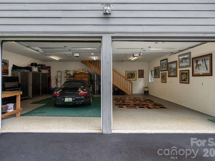 163 Tweetys Knoll, Burnsville, NC 28714.  MLS# CAR4281512, YatesRealty ID 853. Immaculate 2 car garage is oversized and offers workshop space