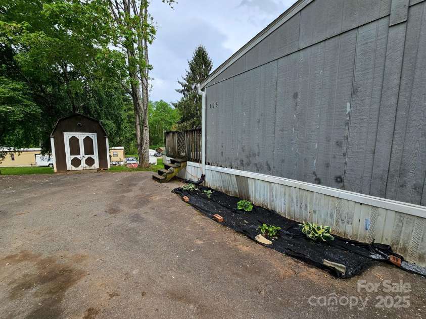 125 Ridgedale Road, Candler, NC 28715.  MLS# CAR4232552, YatesRealty ID 8533. 