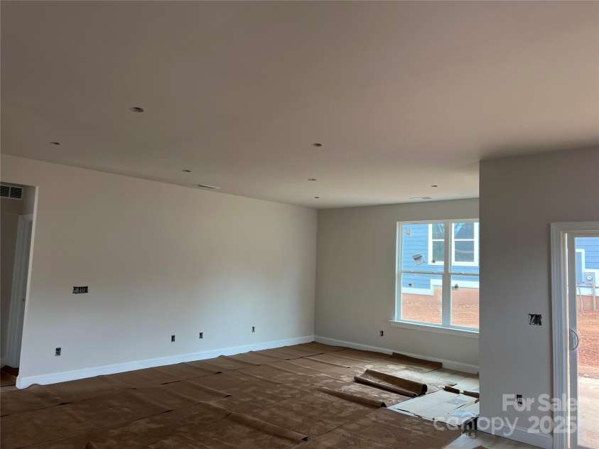 140 First Street, Huntersville, NC 28078.  MLS# CAR4227791, YatesRealty ID 8536. Great room