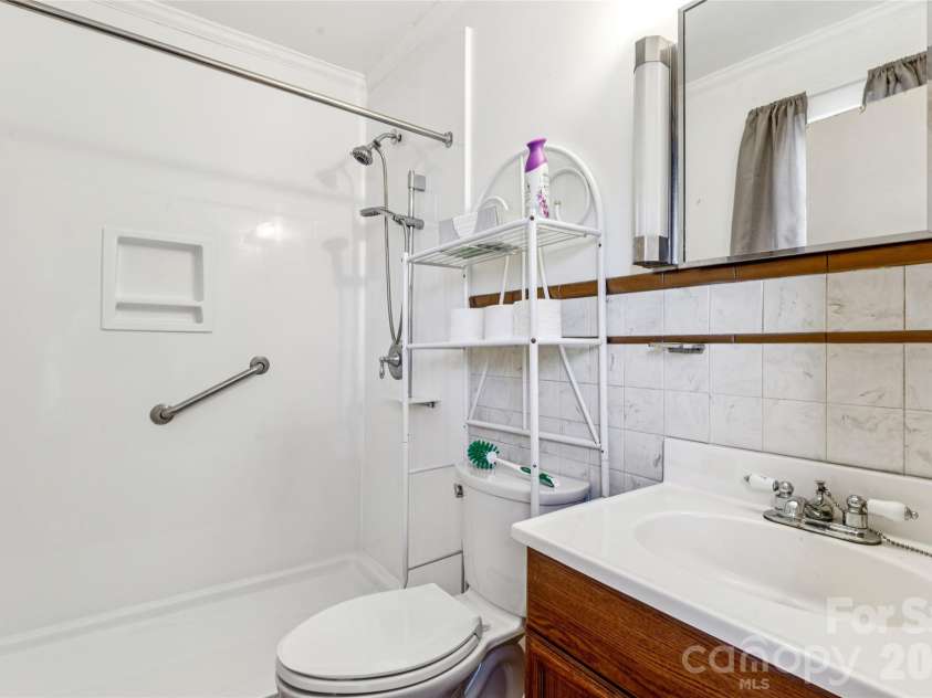 7910 Nc Hwy 90 Highway, Stony Point, NC 28678.  MLS# CAR4360101, YatesRealty ID 8537. Ensuite bath-primary
