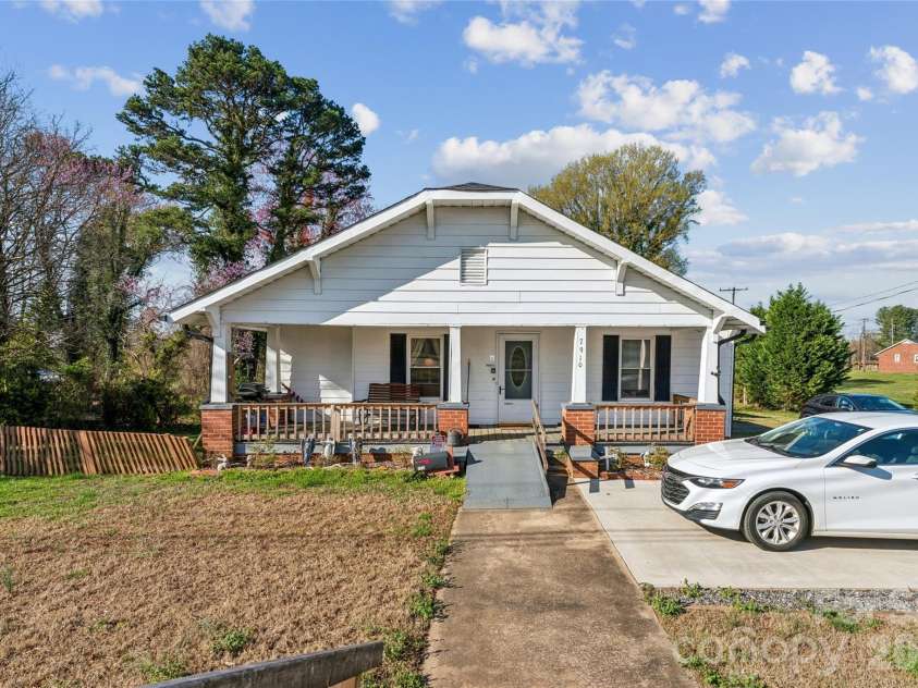7910 Nc Hwy 90 Highway, Stony Point, NC 28678.  MLS# CAR4360101, YatesRealty ID 8537. Front of home