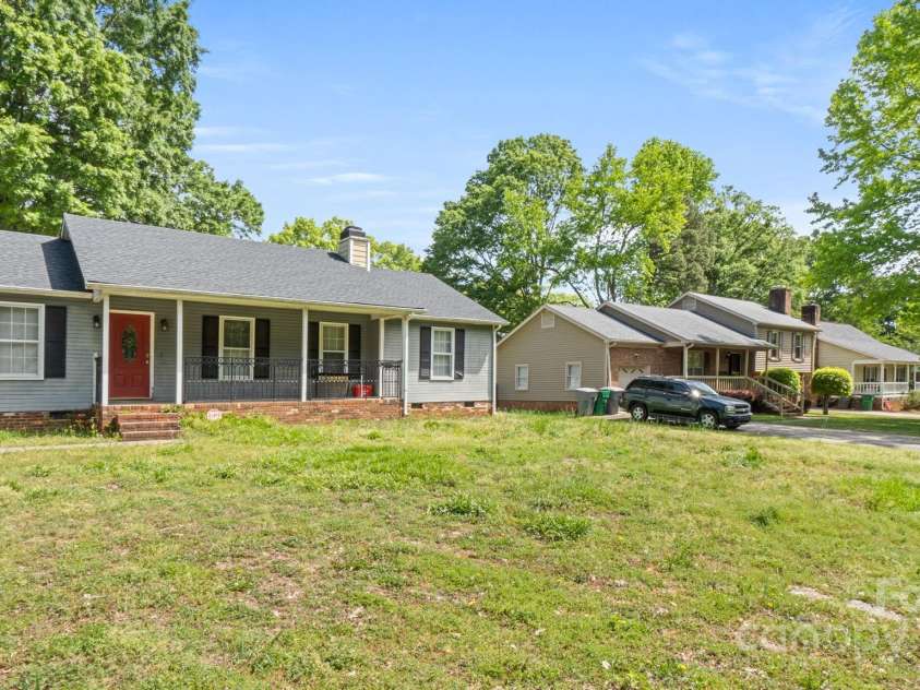 6915 Norchester Court, Charlotte, NC 28227.  MLS# CAR4250063, YatesRealty ID 8539. Just what you're looking for....a large lot with space between homes!