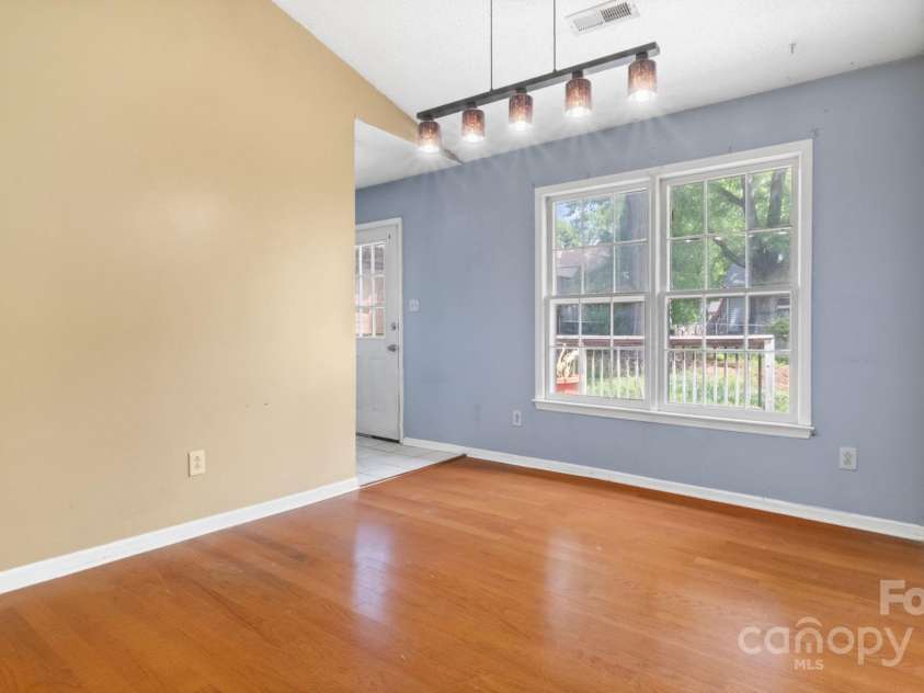 6915 Norchester Court, Charlotte, NC 28227.  MLS# CAR4250063, YatesRealty ID 8539. Out to backyard with huge deck and large fenced backyard