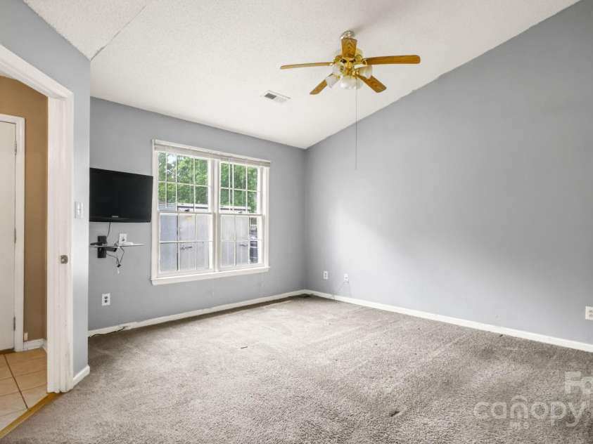 6915 Norchester Court, Charlotte, NC 28227.  MLS# CAR4250063, YatesRealty ID 8539. Primary suite with vaulted ceiling