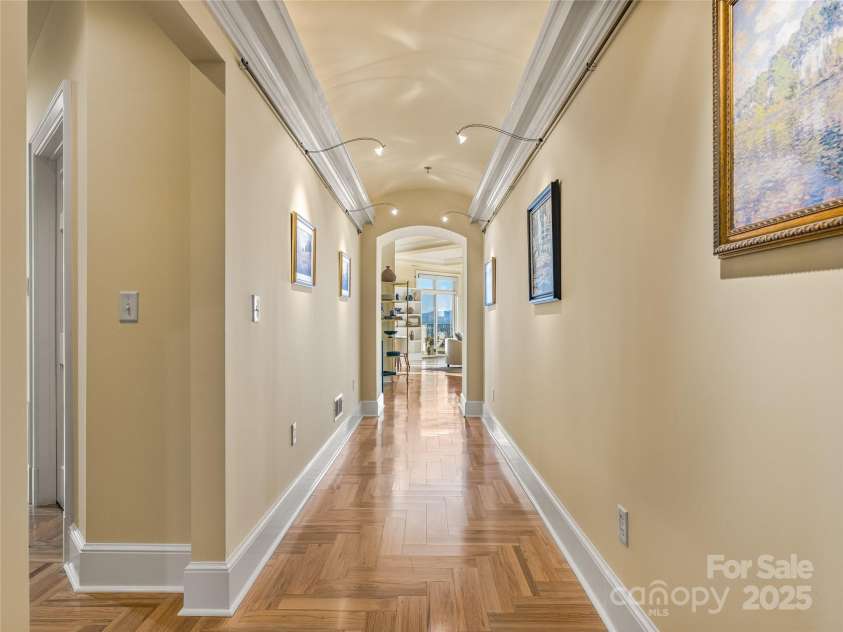 21 Battery Park Avenue, Asheville, NC 28801.  MLS# CAR4322706, YatesRealty ID 8540. Gallery hall with herringbone wood floors