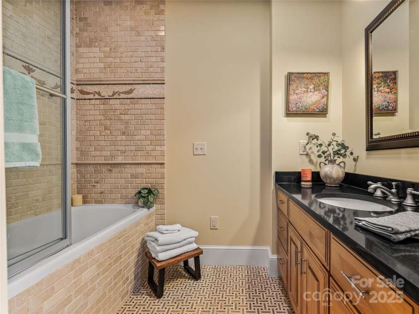 21 Battery Park Avenue, Asheville, NC 28801.  MLS# CAR4322706, YatesRealty ID 8540. Guest bathroom with tub