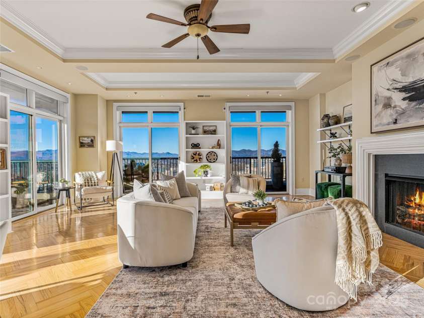 21 Battery Park Avenue, Asheville, NC 28801.  MLS# CAR4322706, YatesRealty ID 8540. Living Room- coffered ceiling with fireplace