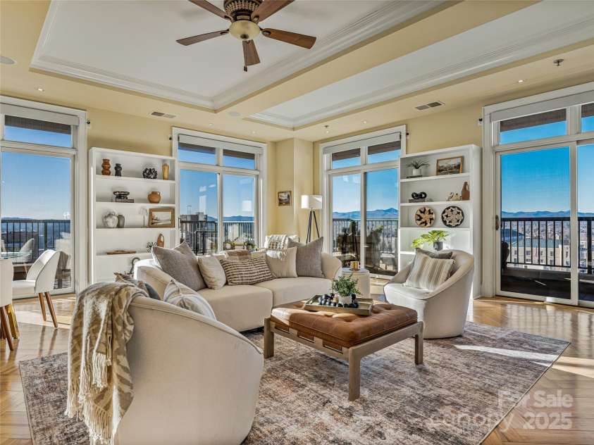 21 Battery Park Avenue, Asheville, NC 28801.  MLS# CAR4322706, YatesRealty ID 8540. Living room with coffered ceiling and built-ins