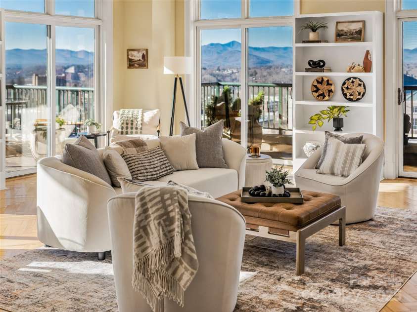 21 Battery Park Avenue, Asheville, NC 28801.  MLS# CAR4322706, YatesRealty ID 8540. Living room with mountain views